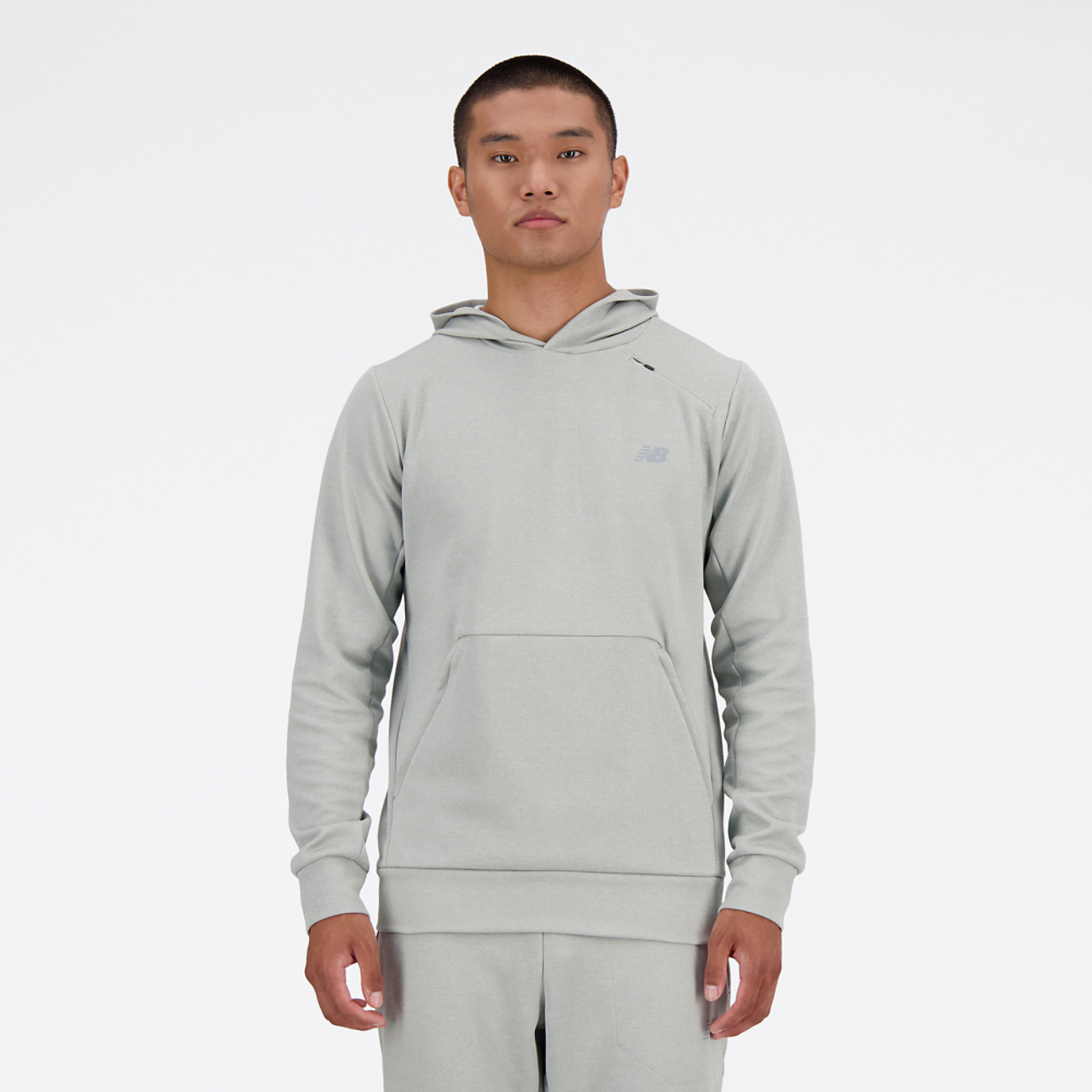 New Balance Tech Knit Pullover Hoodie Image 1 of 4. Tap to open photo gallery.