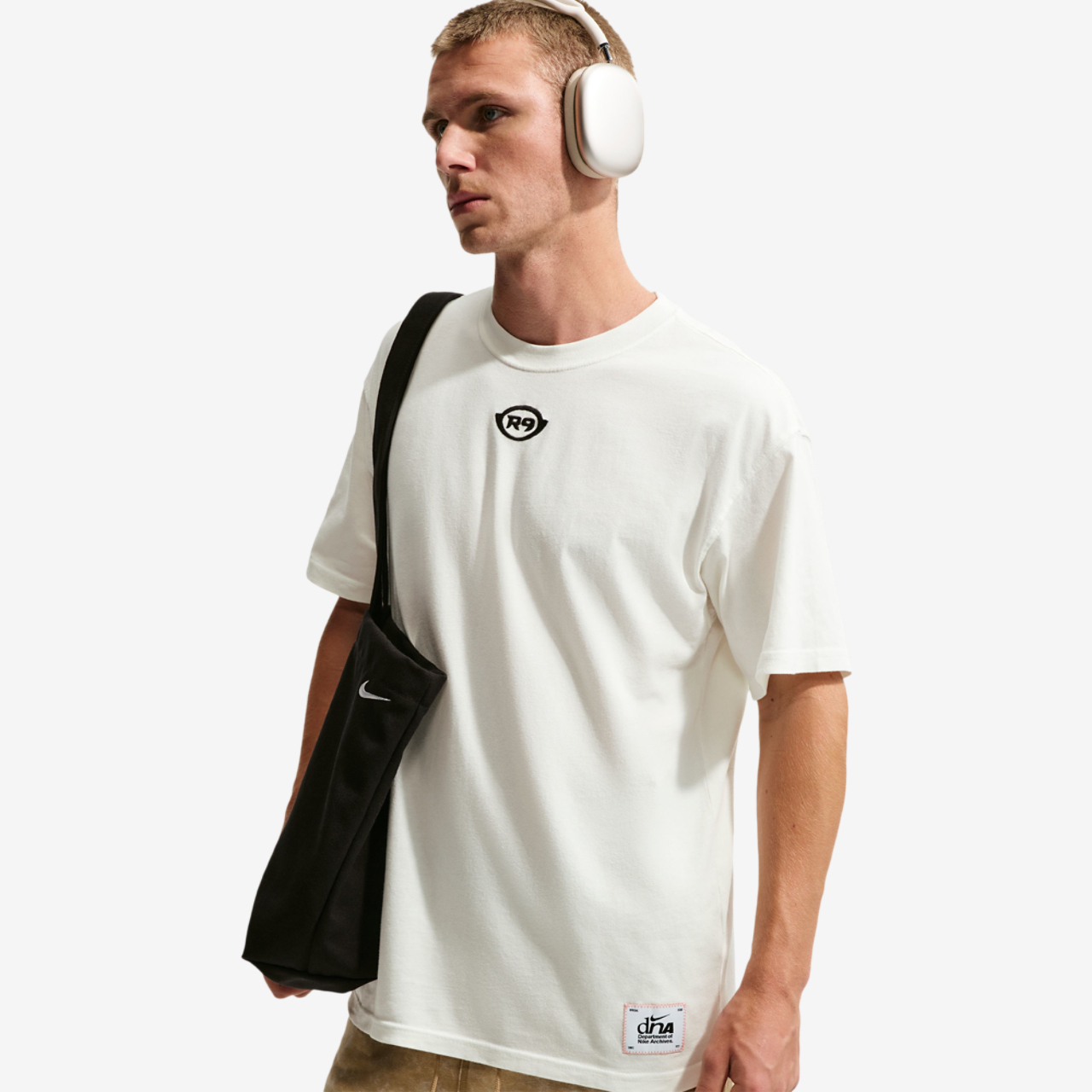 Nike NSW LSE GFB Photo T-Shirt Image 1 of 3. Tap to open photo gallery.
