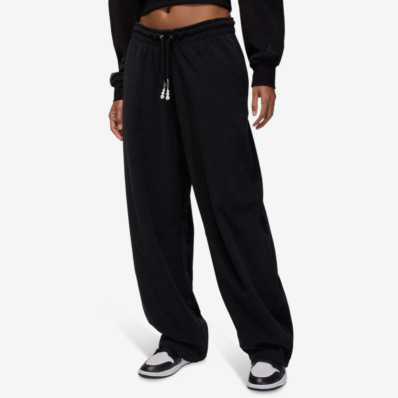 Jordan Flight Fleece Seasonal Barrel Pants Image 1 of 3. Tap to open photo gallery.