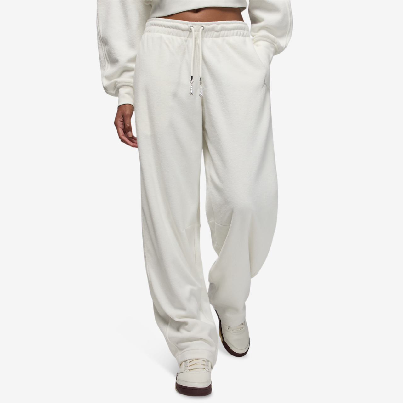 Jordan Flight Fleece Seasonal Barrel Pants Image 1 of 5. Tap to open photo gallery.