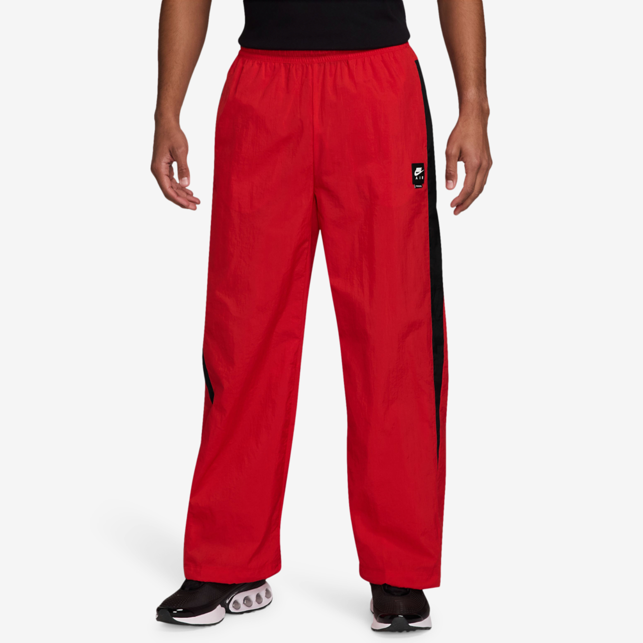 Nike Air Woven Track Pants Image 1 of 3. Tap to open photo gallery.
