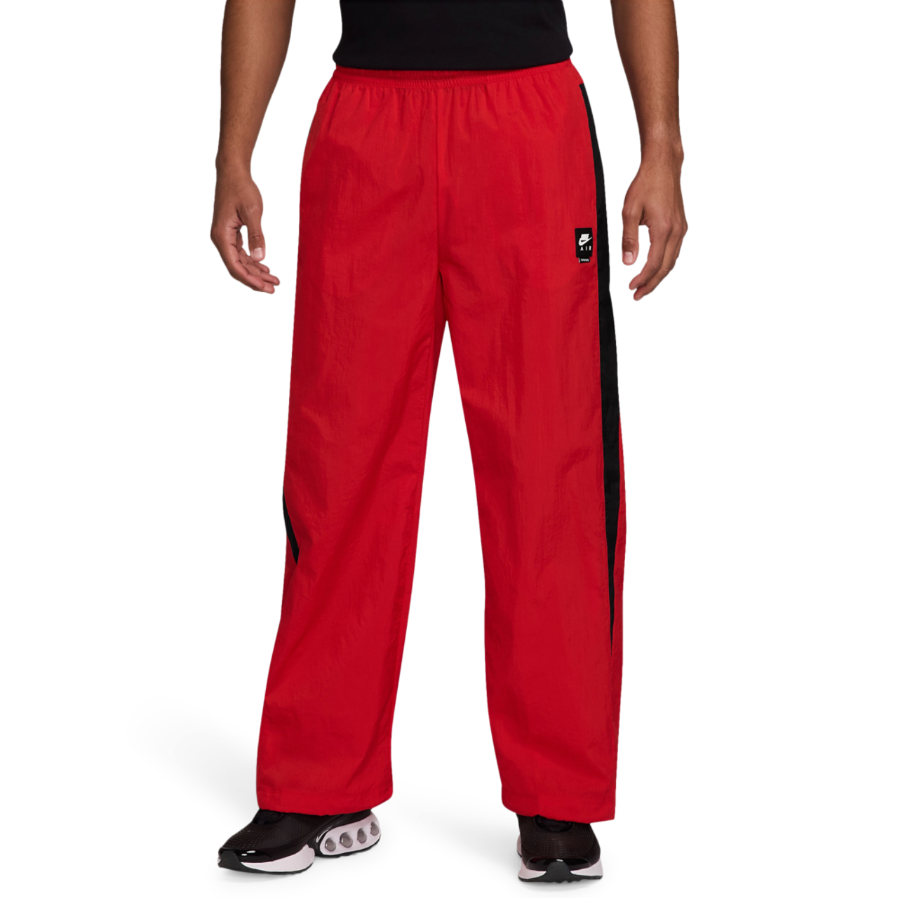 Nike Air Woven Track Pants Image 1 of 3. Tap to open photo gallery.