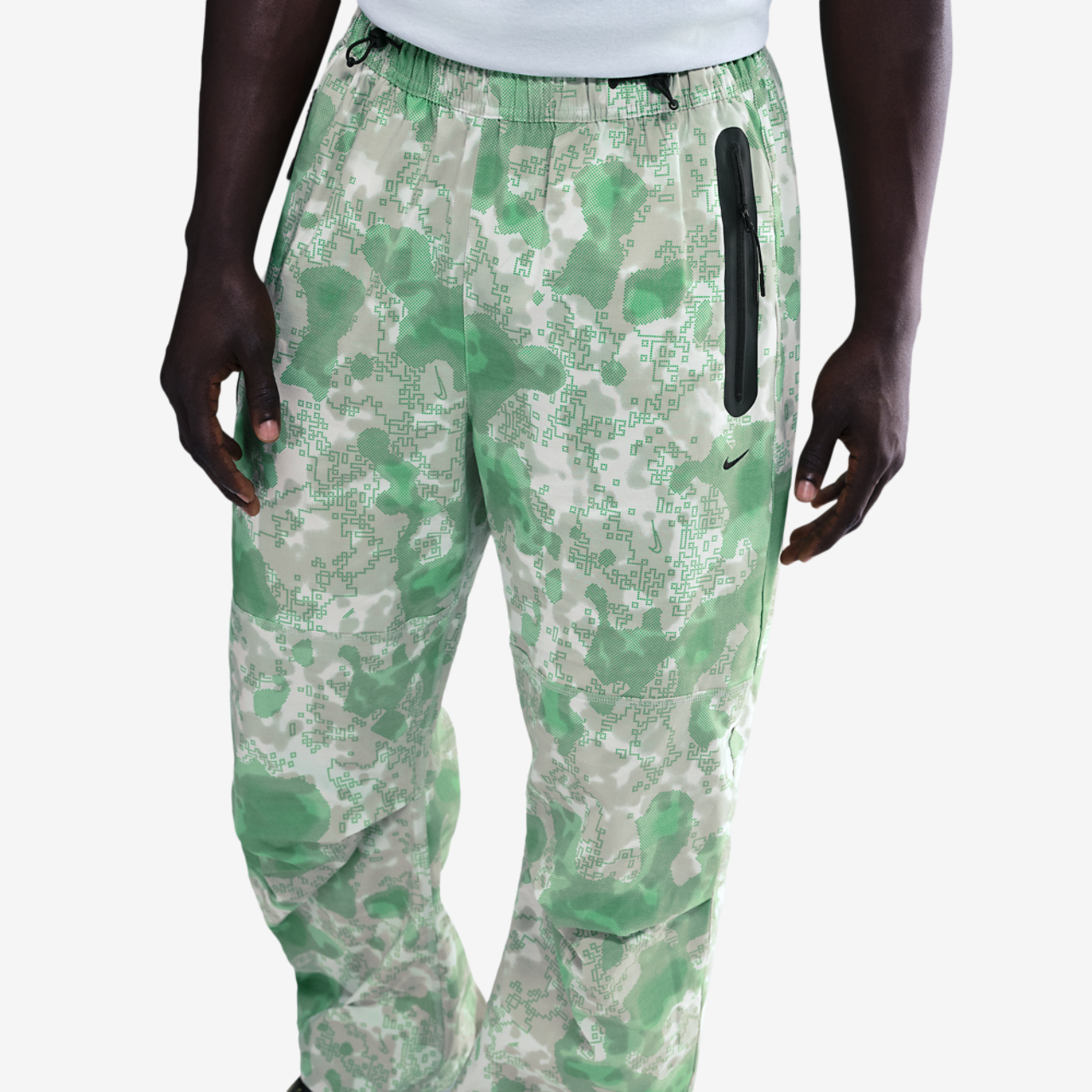 Nike Tech Woven Pant AOP Image 1 of 5. Tap to open photo gallery.