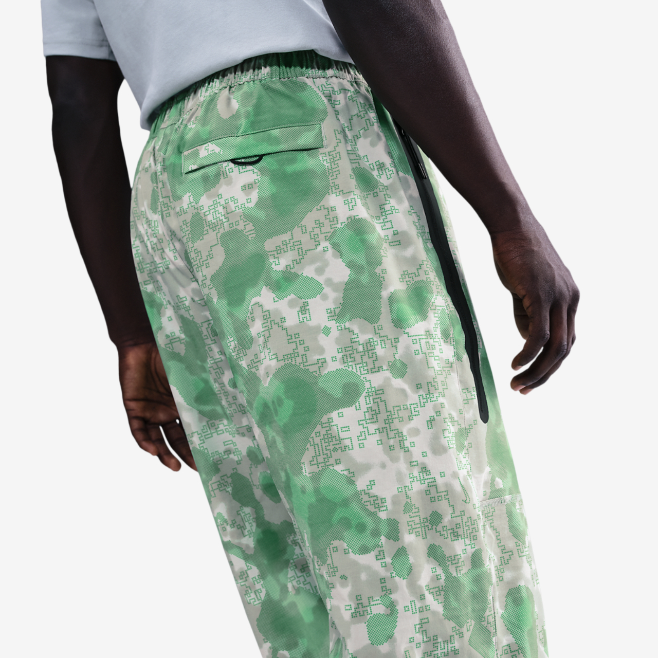 Nike Tech Woven Pant AOP Image 2 of 5. Tap to open photo gallery.