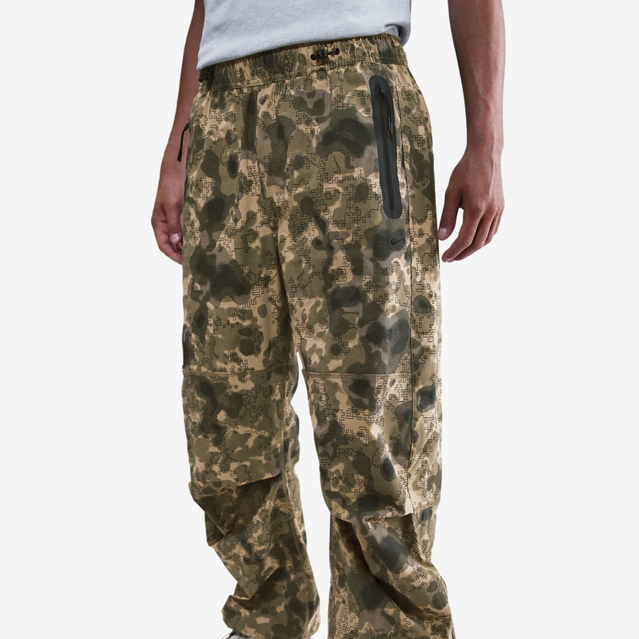 Nike Tech Woven Pant AOP Image 1 of 6. Tap to open photo gallery.