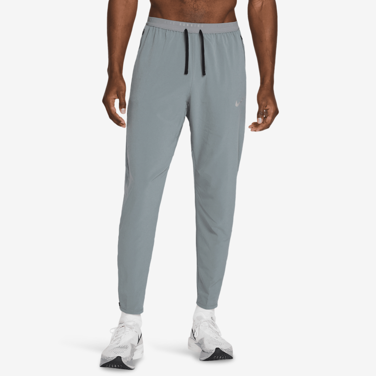 Nike Dri-FIT STRIDE Woven PANT Image 1 of 5. Tap to open photo gallery.