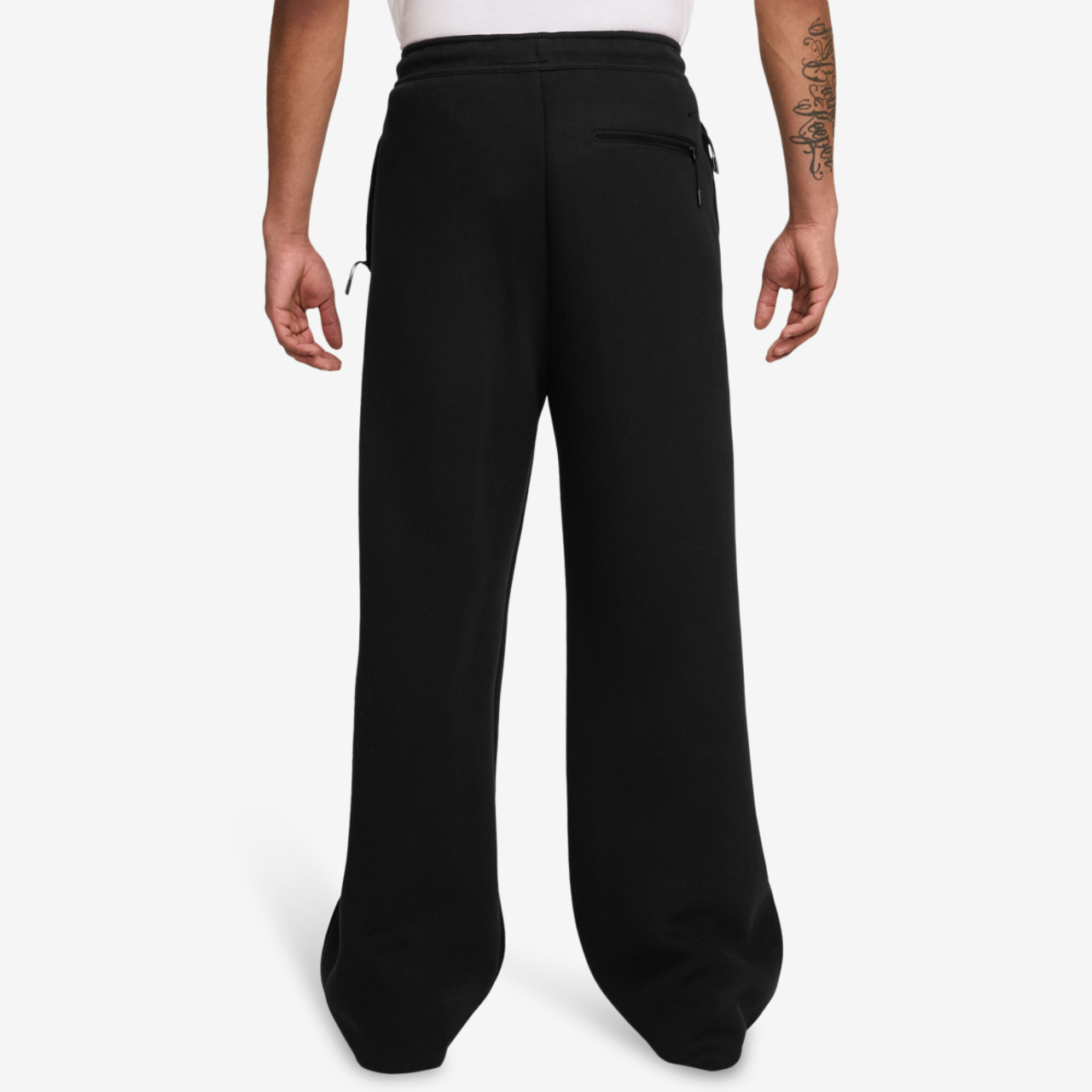 Nike Tech Fleece Pants Image 2 of 3. Tap to open photo gallery.