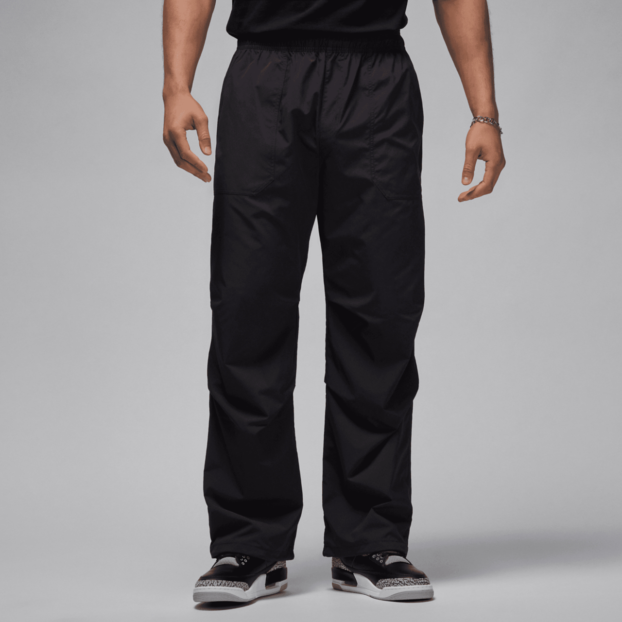 Jordan Essential Statement Woven Pants Image 1 of 8. Tap to open photo gallery.