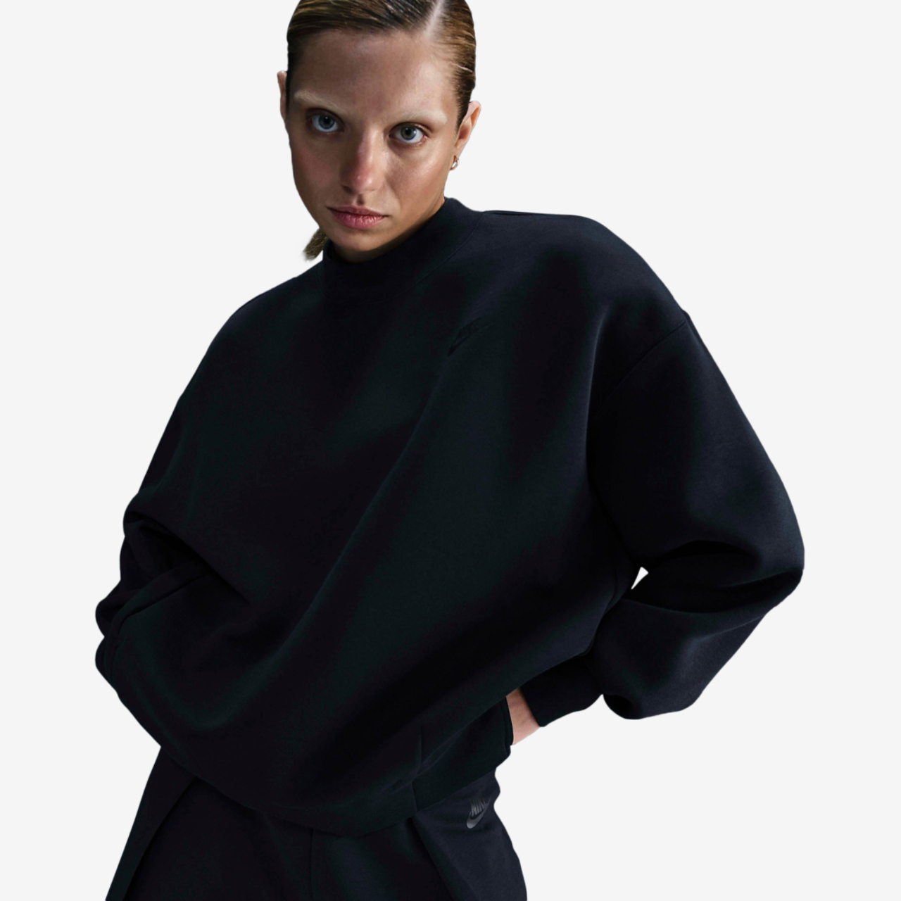 Nike Tech Fleece Oversized Crew Image 1 of 5. Tap to open photo gallery.