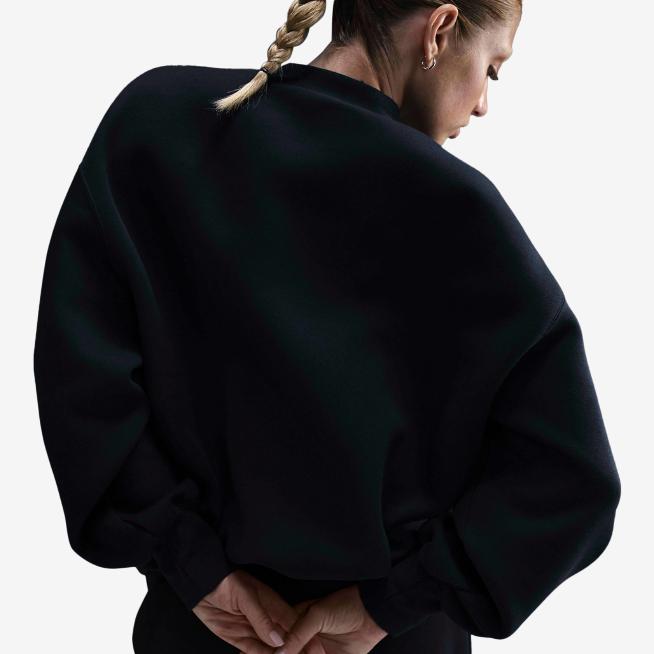 Nike Tech Fleece Oversized Crew Image 2 of 5. Tap to open photo gallery.