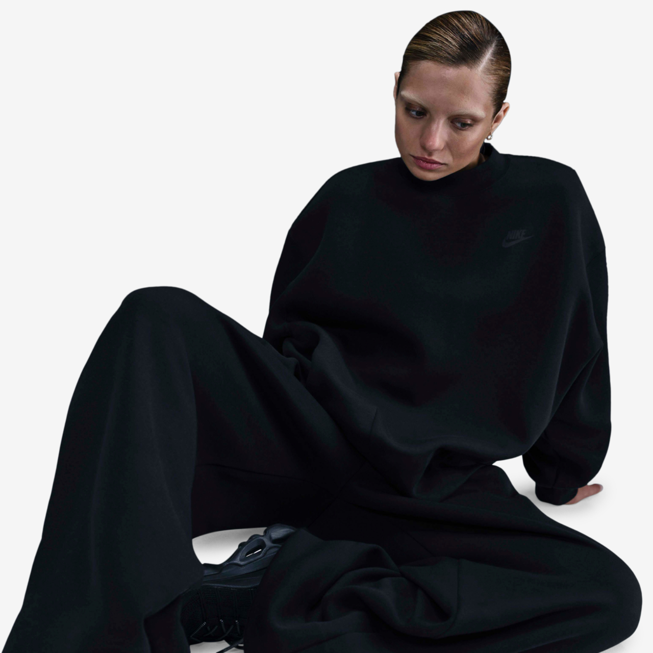 Nike Tech Fleece Oversized Crew Image 3 of 5. Tap to open photo gallery.