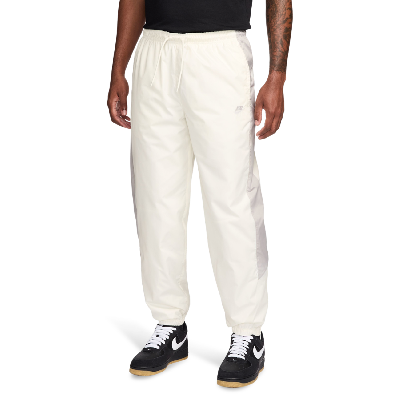 Nike NSW Windrunner Pants Image 1 of 3. Tap to open photo gallery.
