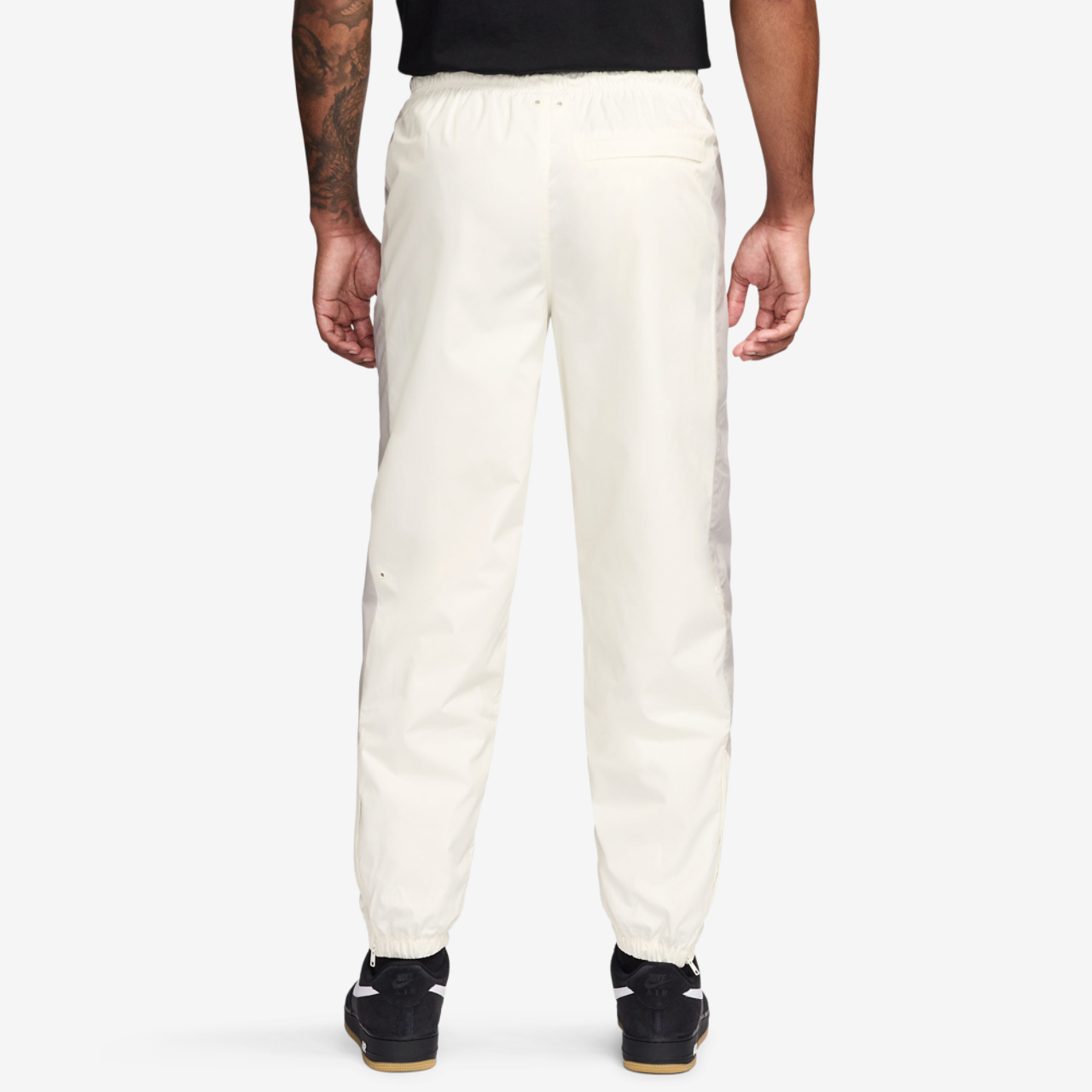Nike NSW Windrunner Pants Image 2 of 3. Tap to open photo gallery.