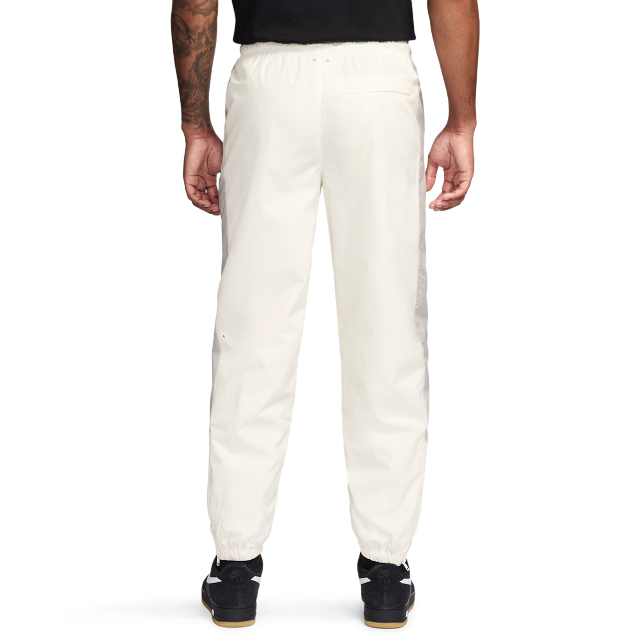 Nike NSW Windrunner Pants Image 2 of 3. Tap to open photo gallery.
