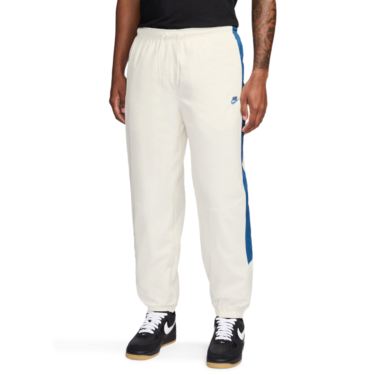 Nike NSW Windrunner Pants Image 1 of 3. Tap to open photo gallery.