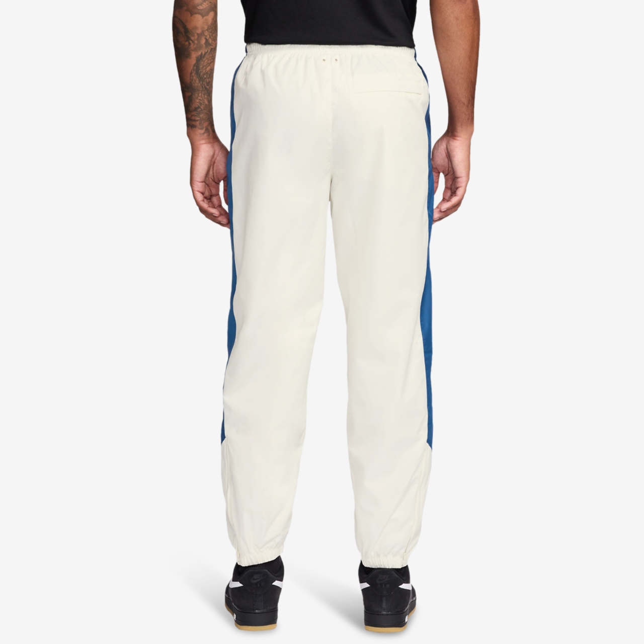 Nike NSW Windrunner Pants Image 2 of 3. Tap to open photo gallery.