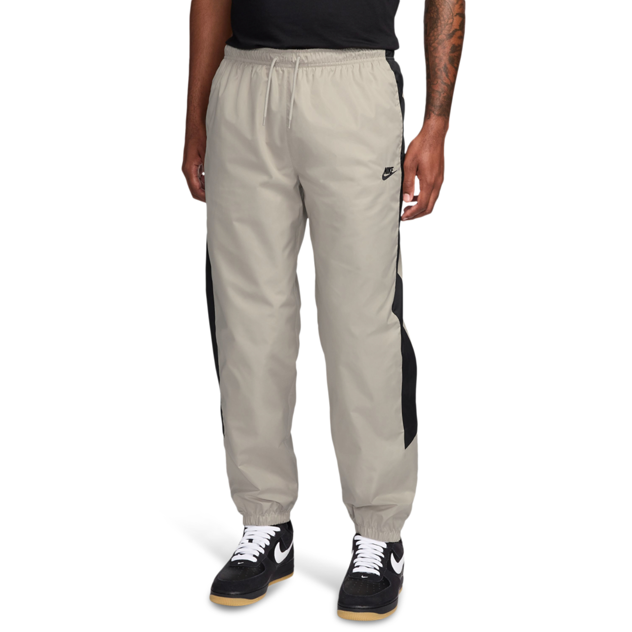 Nike NSW Windrunner Pants Image 1 of 3. Tap to open photo gallery.