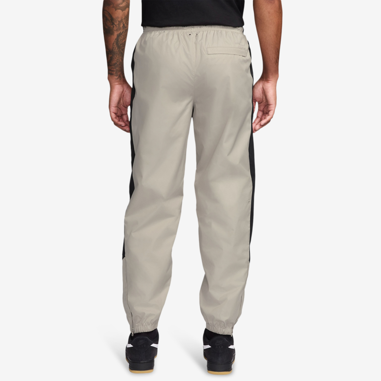 Nike NSW Windrunner Pants Image 2 of 3. Tap to open photo gallery.