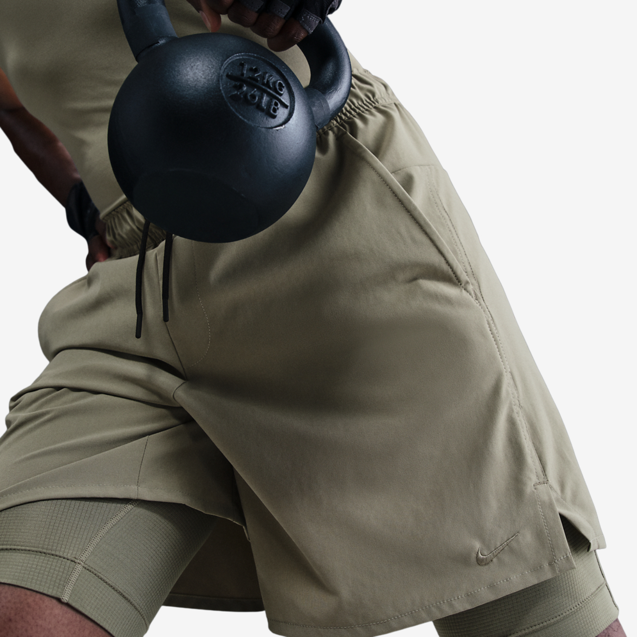 Nike Dri-FIT Unlimited Woven 7 Inch Shorts Image 5 of 11. Tap to open photo gallery.