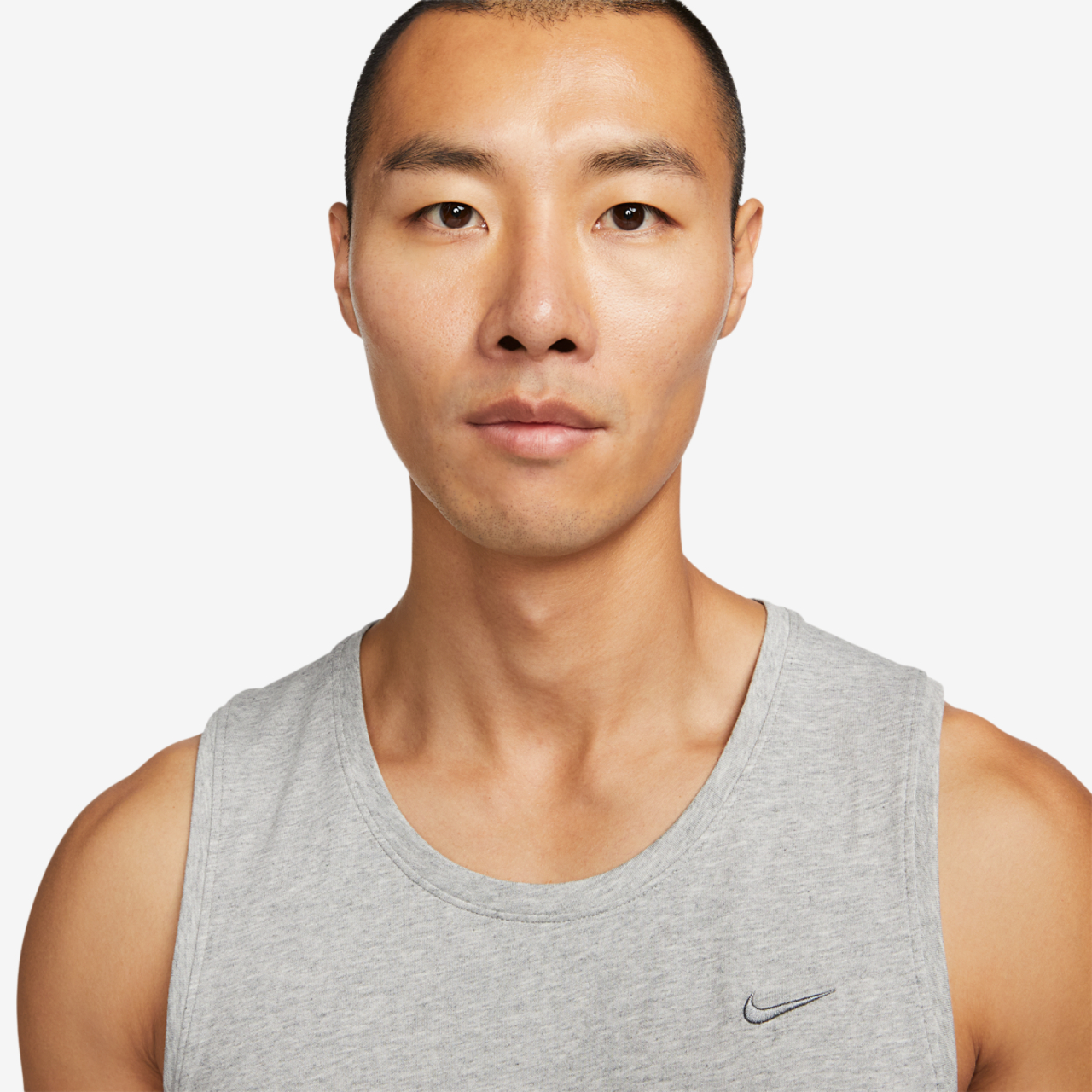 Nike Dri-FIT Primary Statement Tank Image 1 of 4. Tap to open photo gallery.