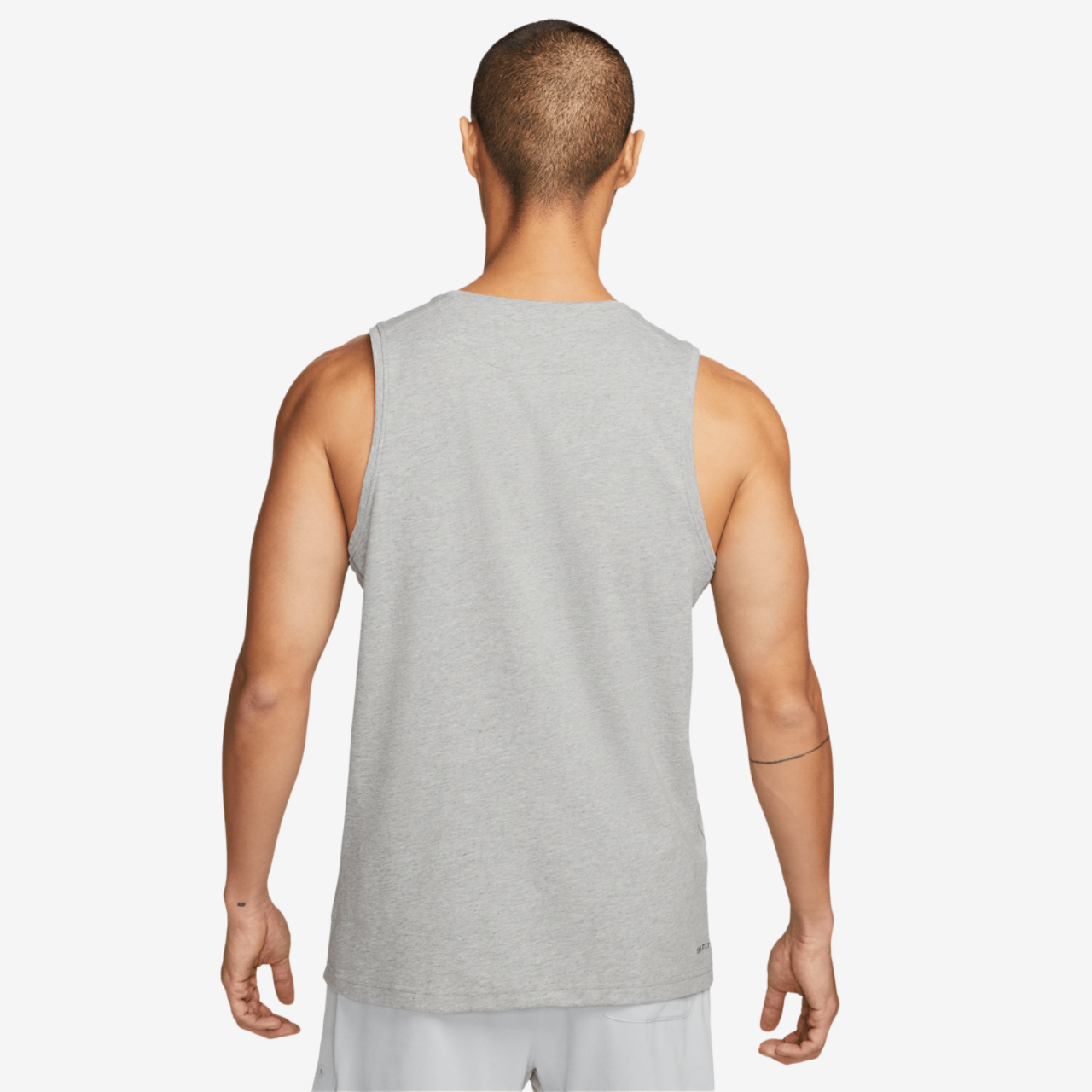 Nike Dri-FIT Primary Statement Tank Image 4 of 4. Tap to open photo gallery.