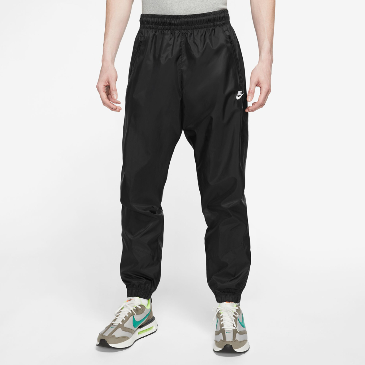 Nike Windrunner Woven Lined Pants Image 1 of 3. Tap to open photo gallery.