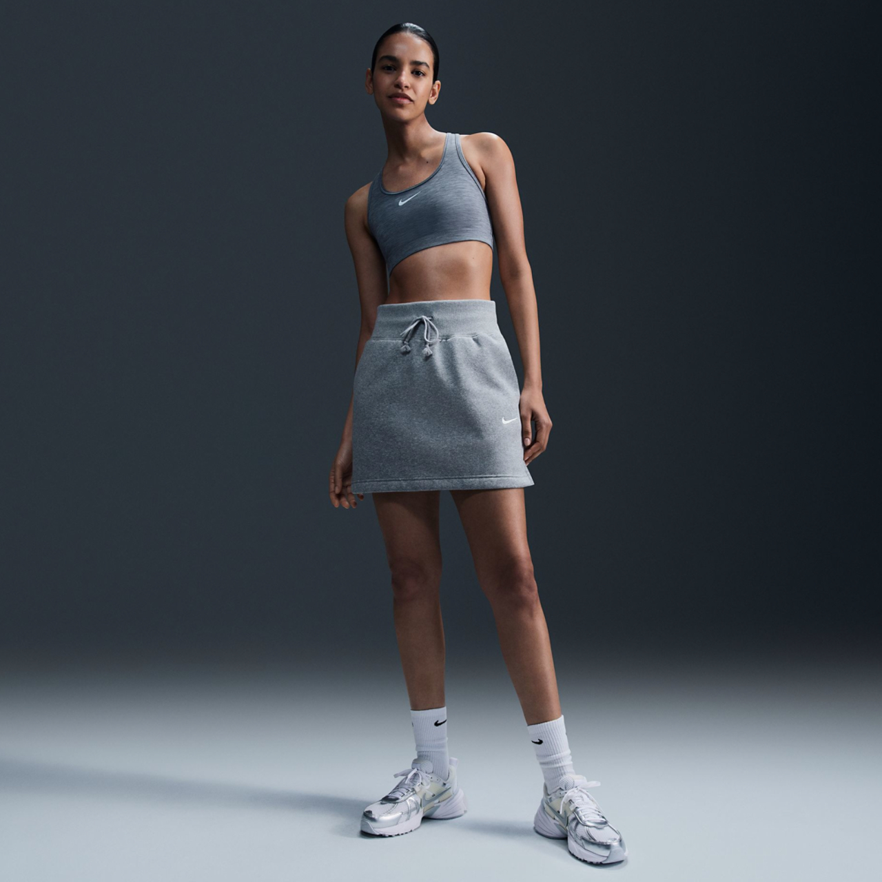 Nike Dri-FIT Swoosh Medium Support Bra Image 1 of 2. Tap to open photo gallery.