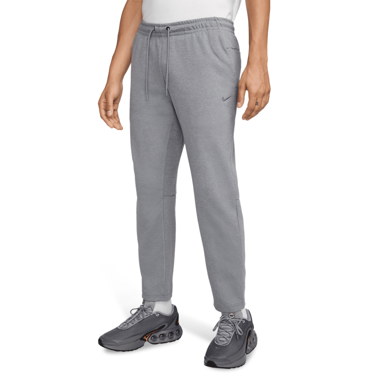 Nike Dri-FIT UV Primary Tapered Pant Image 1 of 4. Tap to open photo gallery.