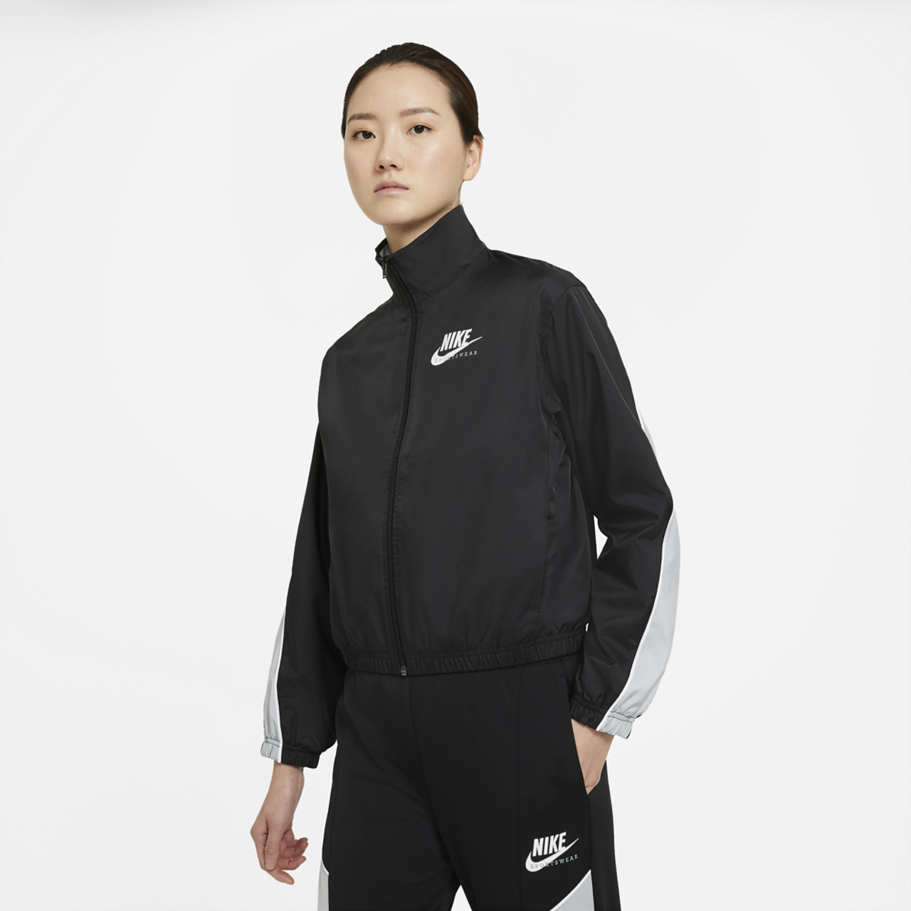 Nike Heritage Woven Jacket Image 1 of 2. Tap to open photo gallery.